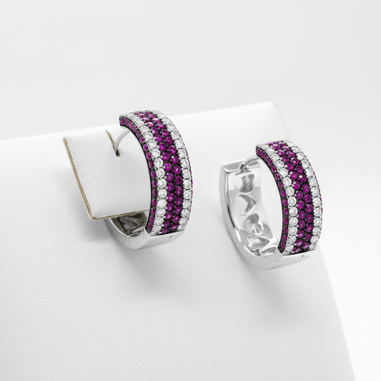 Luxury studio shot of diamond ruby hoops